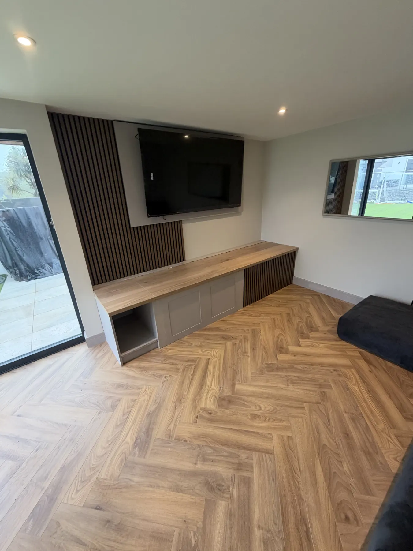 Arden & Oak garden room build — The media wall